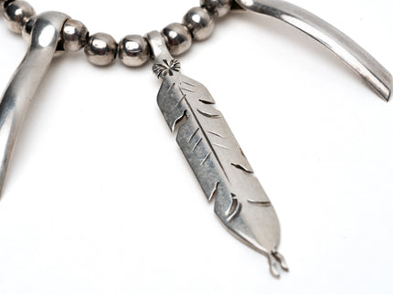 Tribal Inspired Necklace With a Feather Pendant