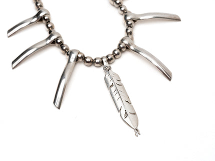 Tribal Inspired Necklace With a Feather Pendant