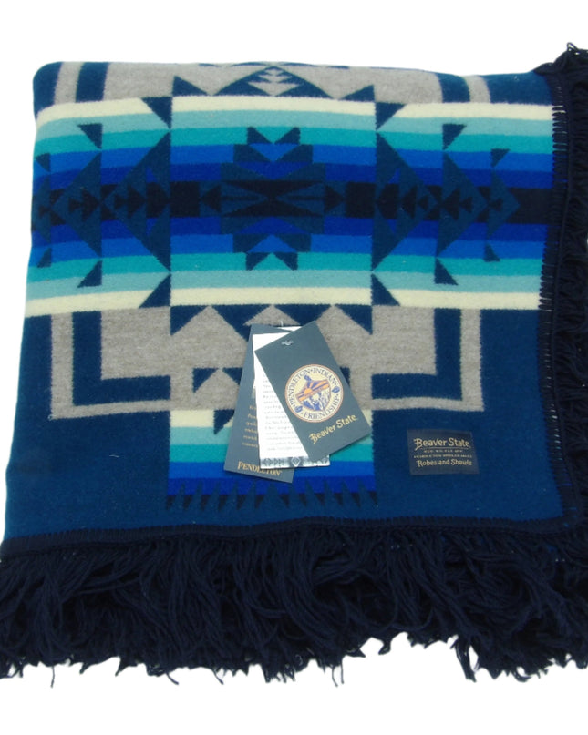 Pendleton Chief Joseph Blanket in Aegean featuring a traditional Native American-inspired geometric pattern with arrow motifs, folded neatly to show intricate design and soft wool texture. front View 