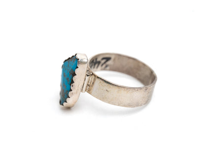 Authentic Navajo Kingman turquoise ring on a white background