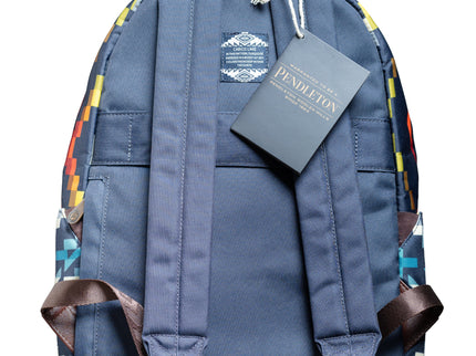 Back view of backpack showing blue and brown straps and Pendleton tag