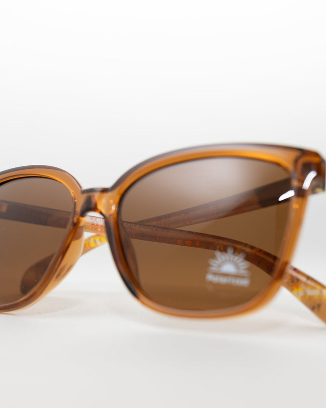 Brown sunglasses with a polarized visible sticker on a white background