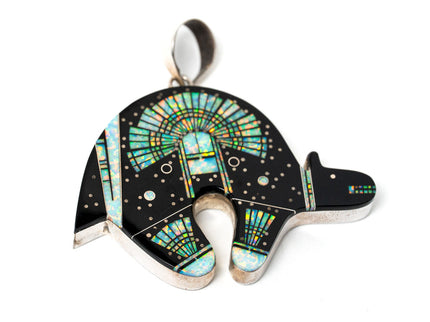 Jet black bear shaped inlay Navajo pendant with a Yei on the surface in opal