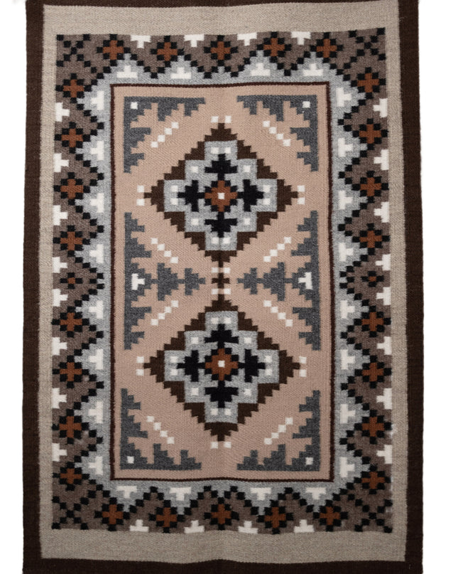 Hand-woven Navajo Rug with geometric pattern on a plain white background, flat view