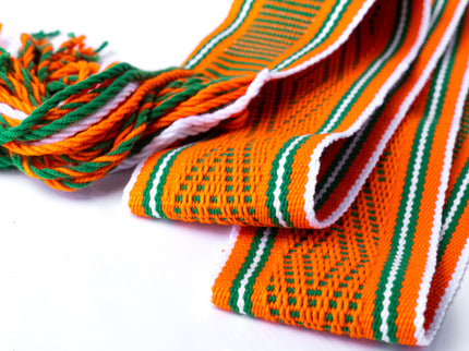 Navajo Sash Belt that is Orange with Green and White Stripes. Fold on itself
