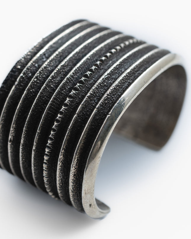 Wide Shadow Stacked Cuff by Navajo Silversmith Harrison Jim