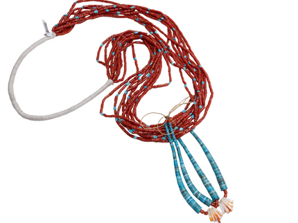 Navajo coral jacloo wrapped necklace with a white strap on a white background
