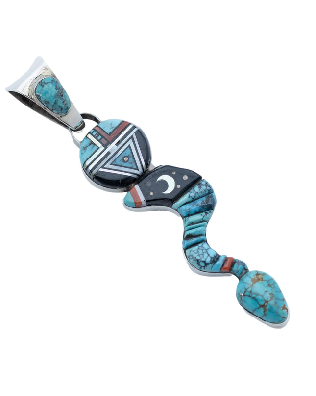 Pendant shaped like a snake made with turquoise, jet black stone, and sterling silver with a moon in the middle and a circular head with the design of a Navajo deity on a white background