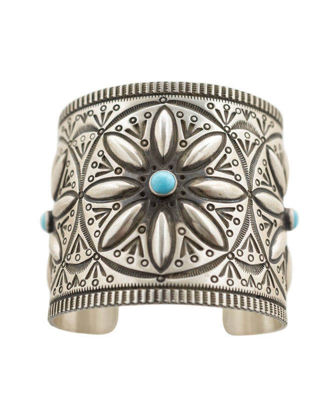 Navajo Herman Smith sterling silver cuff with three Beauty turquoise gemstones and hand-stamped patterns