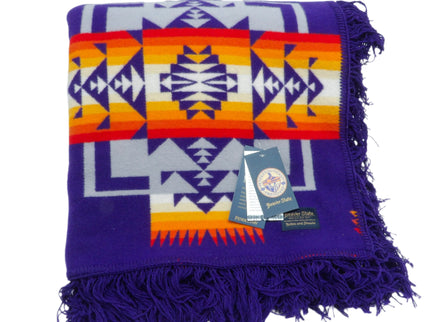 Pendleton Chief Joseph Blanket in purple featuring a traditional Native American-inspired geometric pattern with arrow motifs, folded neatly to show intricate design and soft wool texture. front View 