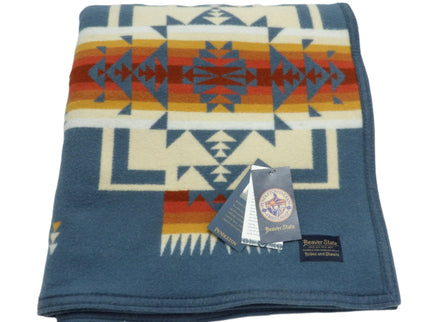 Pendleton Chief Joseph Blanket in Shale featuring a traditional Native American-inspired geometric pattern with arrow motifs, folded neatly to show intricate design and soft wool texture. front View 