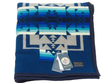 Pendleton Chief Joseph Blanket in Aegean featuring a traditional Native American-inspired geometric pattern with arrow motifs, folded neatly to show intricate design and soft wool texture. front View 