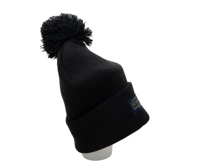 Side view of a Pendleton classic black beanie with pom-pom on a white background