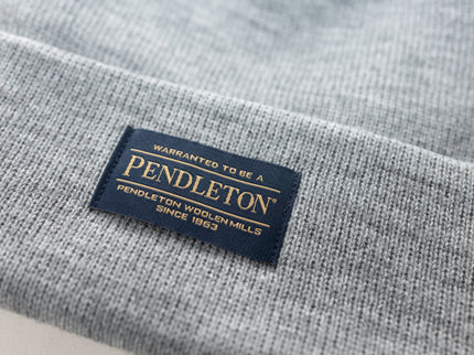 Close up of the Pendleton tag on a grey classic beanie