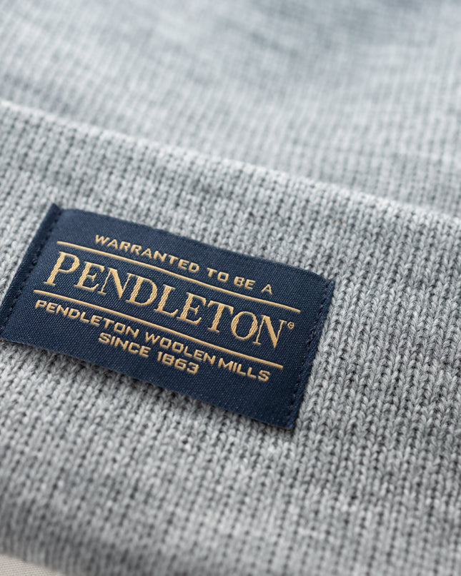 Close up of the Pendleton tag on a grey classic beanie