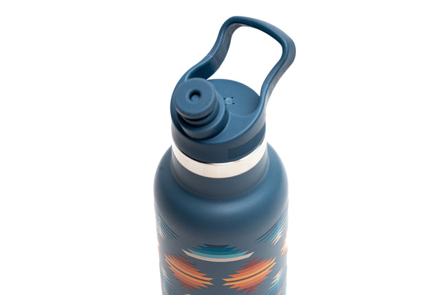 Close up of a blue water bottle and it's lid with a colorful design on a white background