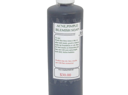 Clear 16oz bottle of a dark liquid used for acne, pimple, and blemish soap