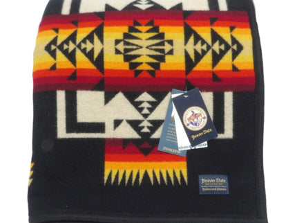 Pendleton Chief Joseph Blanket in Black featuring a traditional Native American-inspired geometric pattern with arrow motifs, folded neatly to show intricate design and soft wool texture. front View 