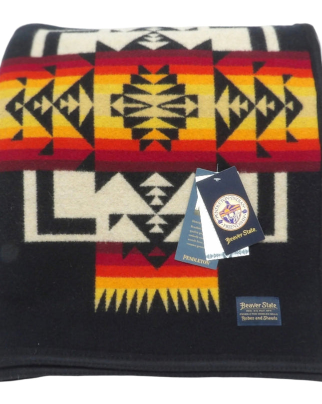 Pendleton Chief Joseph Blanket in Black featuring a traditional Native American-inspired geometric pattern with arrow motifs, folded neatly to show intricate design and soft wool texture. front View 