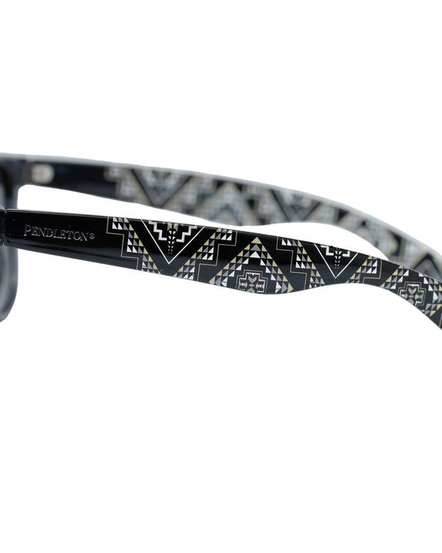 Side view Pendleton sunglasses with oxbow patterned arm on a white background 