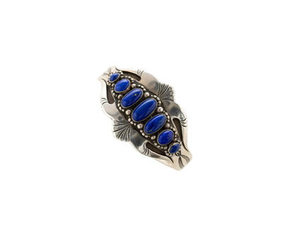 Silver bracelet with lapis stones on a white background