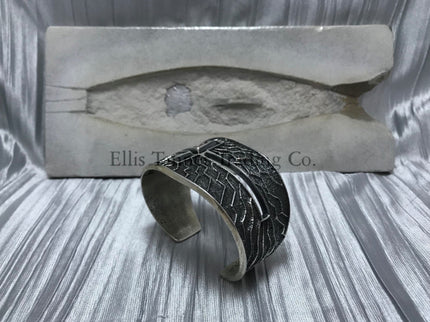 Rough Silver Cuff, bottom cross cutout, burst vein silver lines. 
