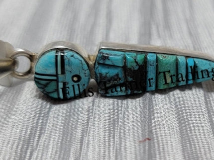 Ervin P. Tsosie Bisbee Yei Inlay Pendant