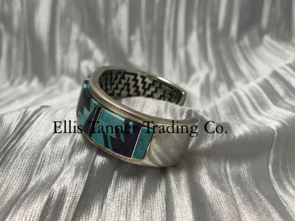 Matching Bracelet featuring Sleeping Beauty turquoise and purple Sugilite Inlayed stones, highlights bold geometric patterns set in sterling silver. side profile